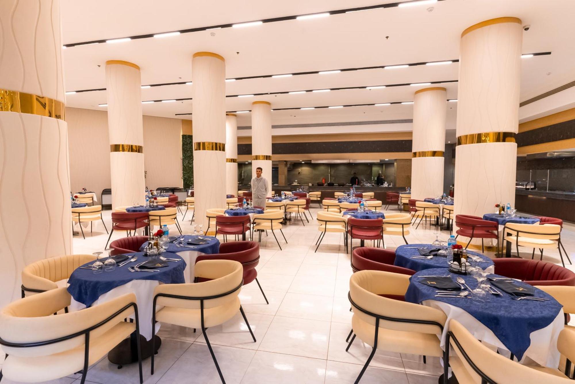 The V Luxury Resort Sahl Hasheesh Hurghada Luaran gambar The restaurant