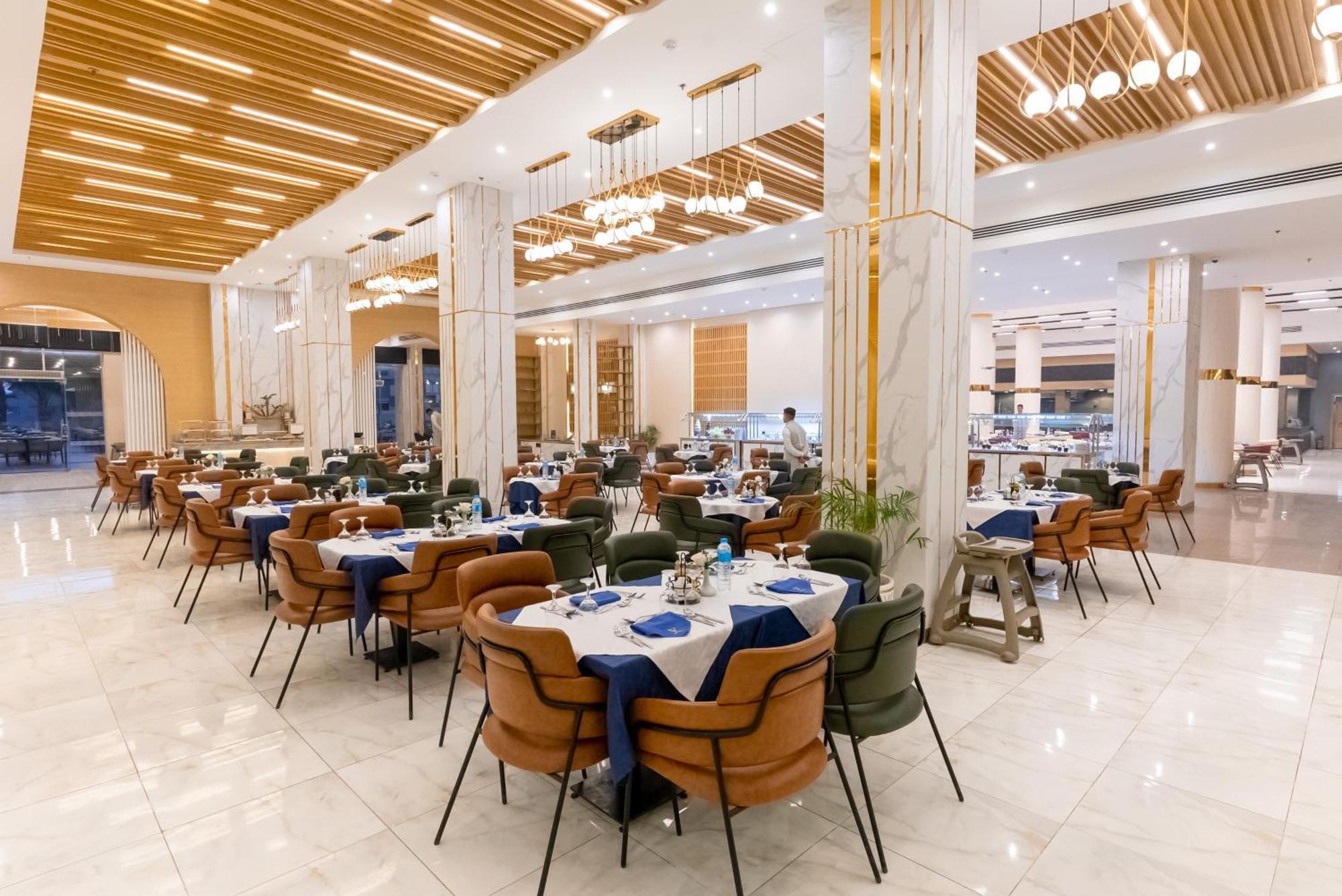 The V Luxury Resort Sahl Hasheesh Hurghada Luaran gambar The restaurant