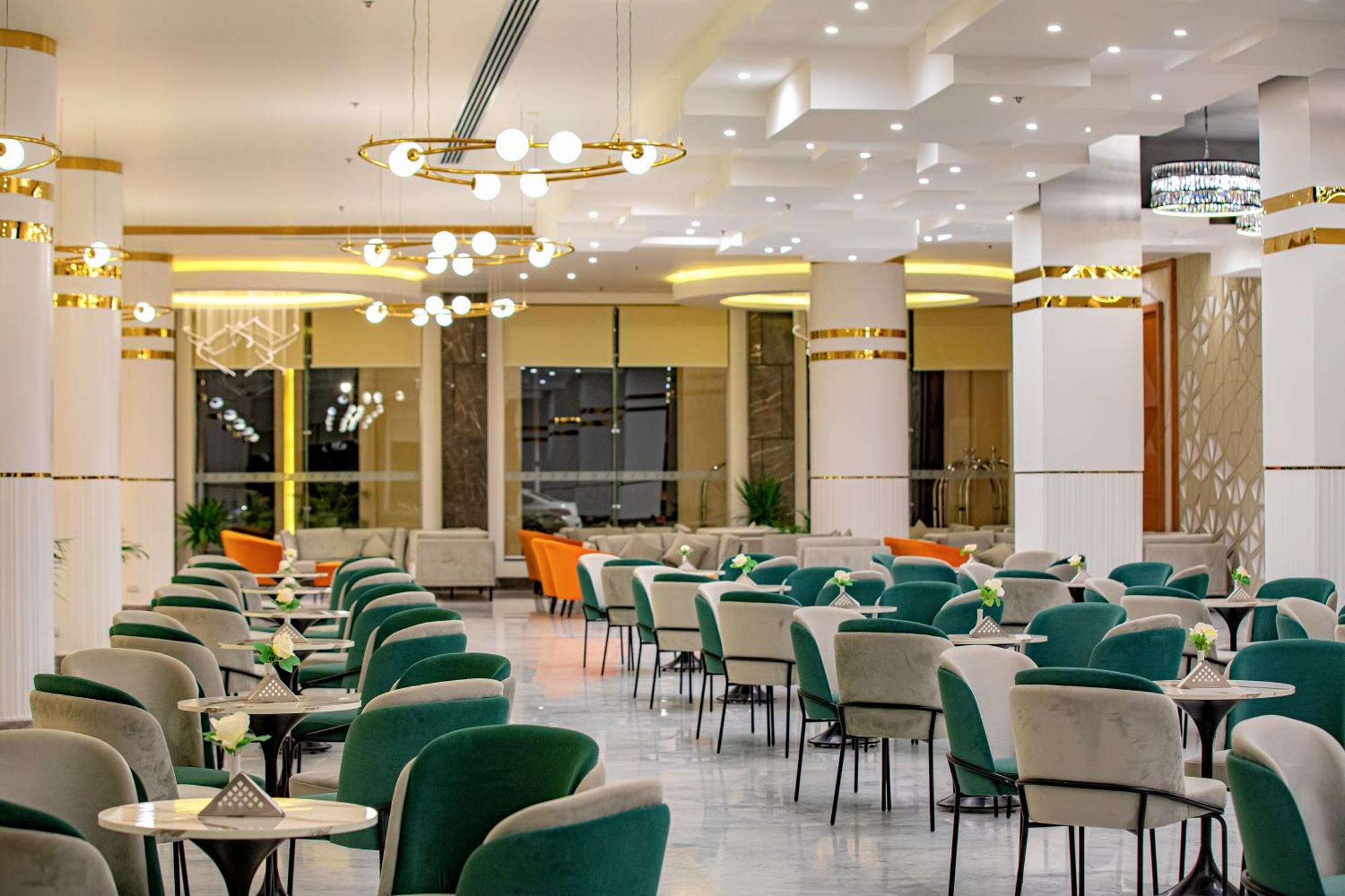 The V Luxury Resort Sahl Hasheesh Hurghada Luaran gambar The interior of the restaurant